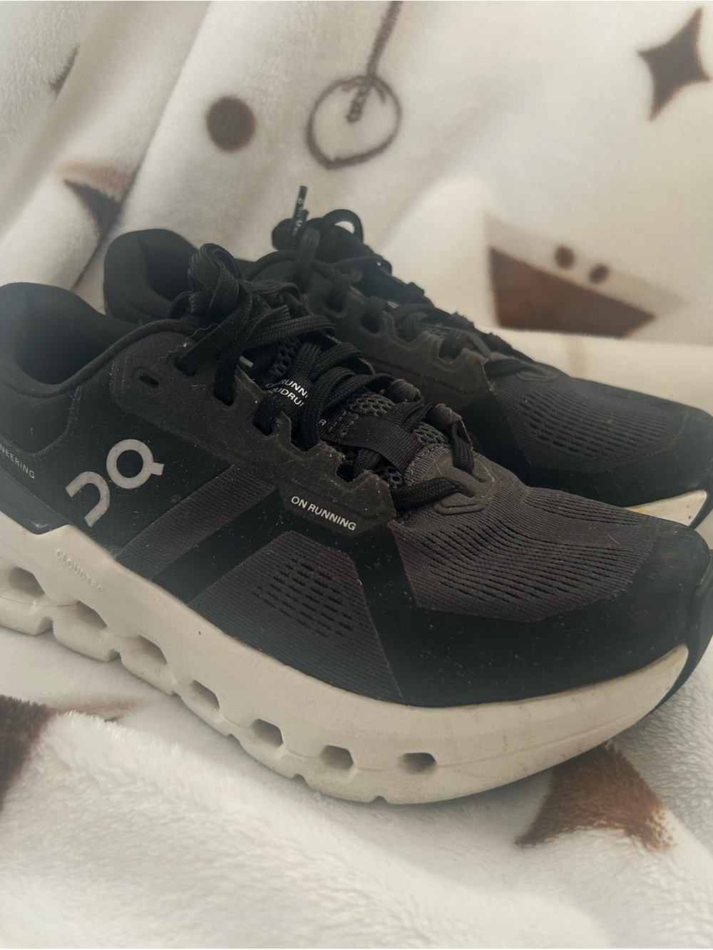 On Running Black and White Cloud-Inspired Sneakers